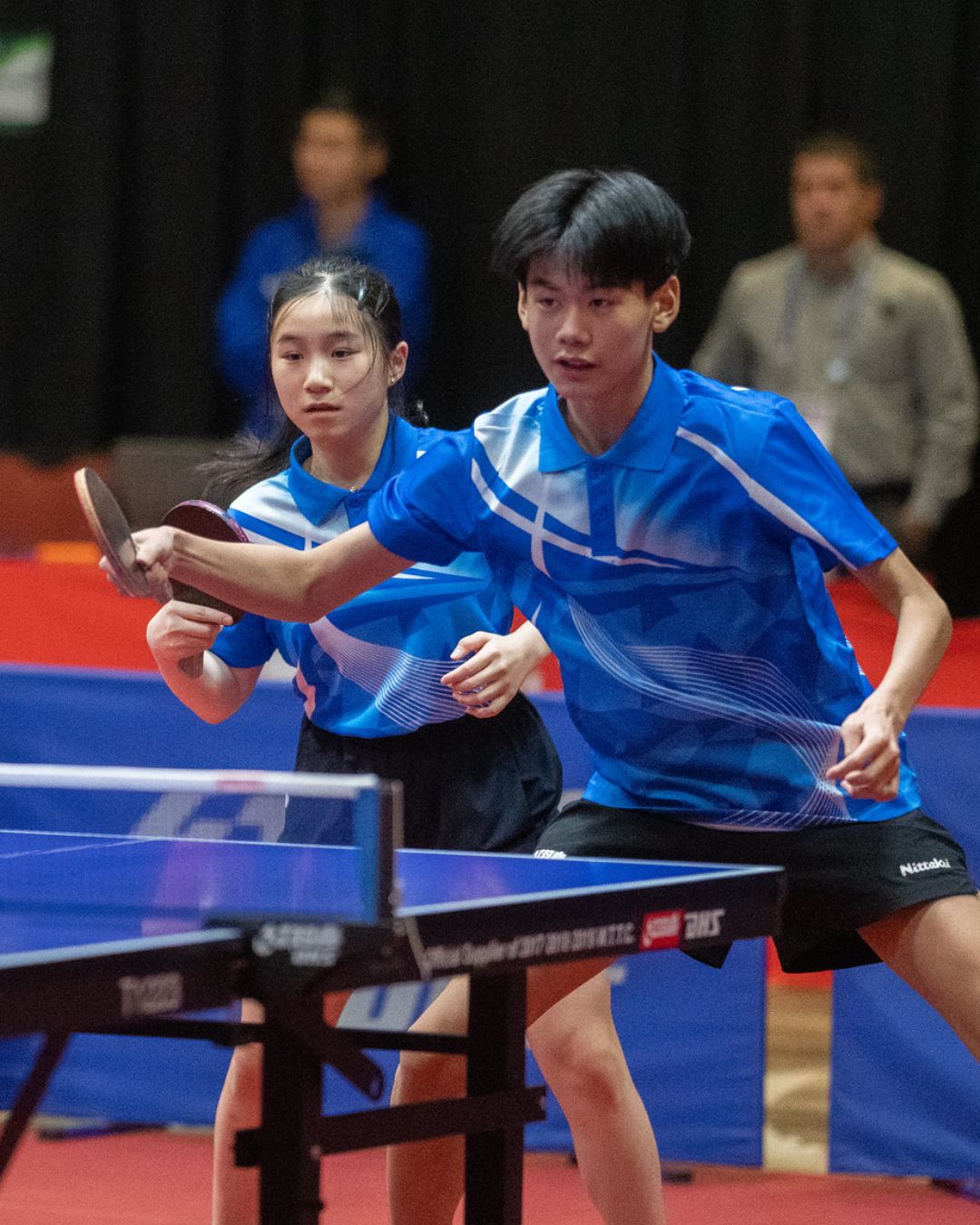 Team BC athletes compete in doubles table tennis at the Canada Games.