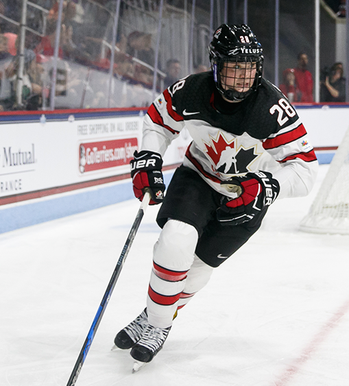 Team BC alum Micah Zandee-Hart competing for Canada in ice hockey.